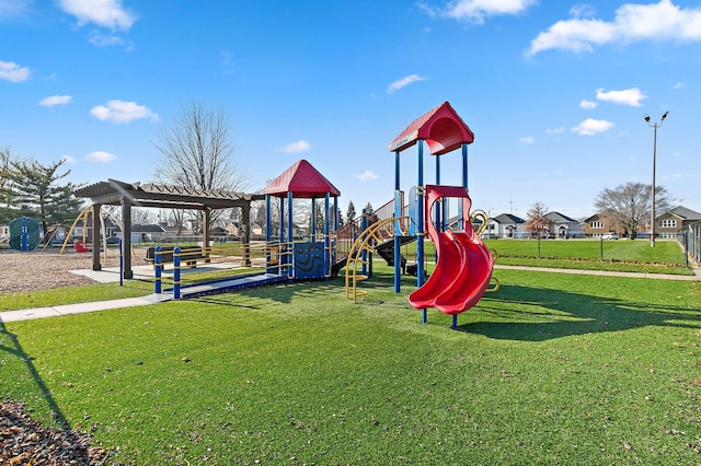 view of playground featuring a lawn