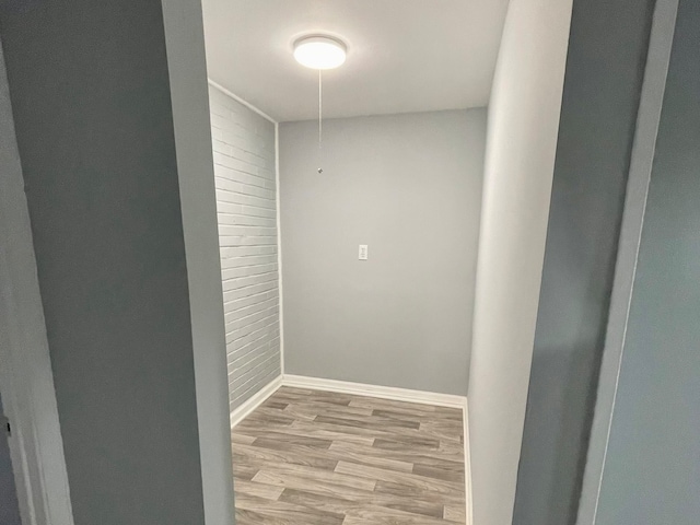 corridor featuring light hardwood / wood-style floors