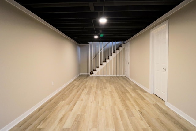 basement featuring light hardwood / wood-style floors