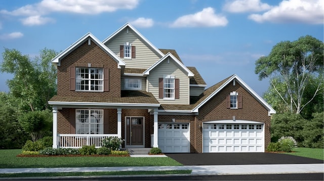 view of front of house featuring a porch, a garage, and a front lawn