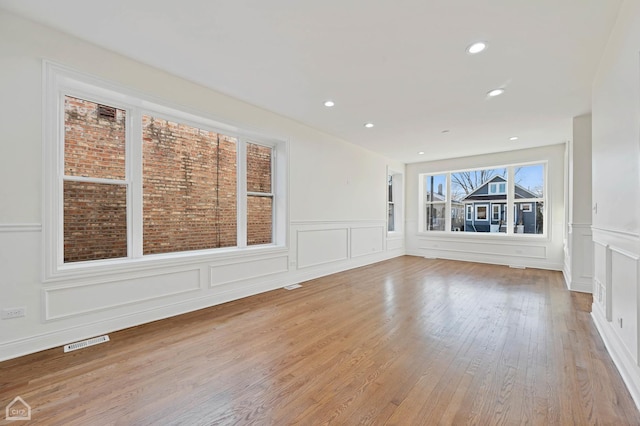 empty room featuring light hardwood / wood-style floors