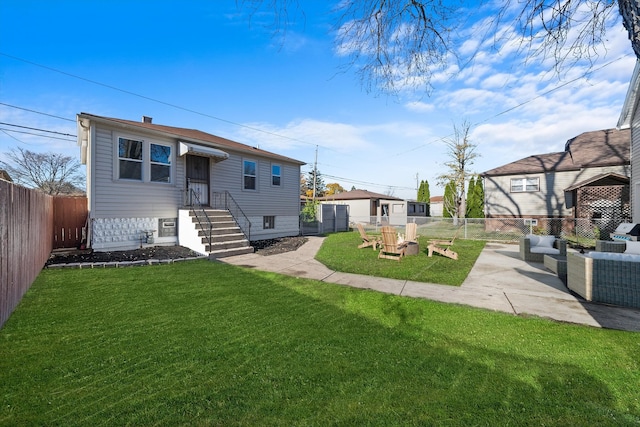 exterior space featuring outdoor lounge area, a patio, and a front yard