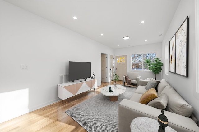 living room featuring light hardwood / wood-style floors