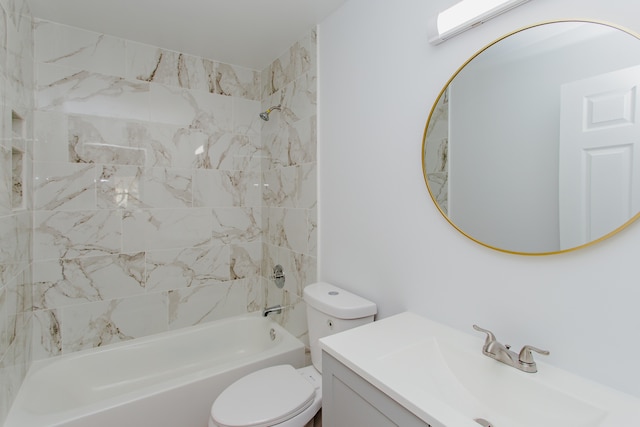 full bathroom with vanity, toilet, and tiled shower / bath