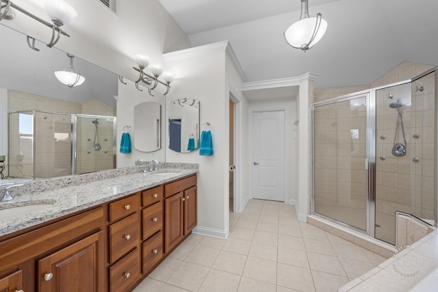 bathroom with vanity, tile patterned floors, and an enclosed shower