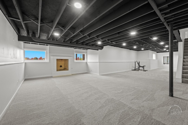 basement with carpet flooring