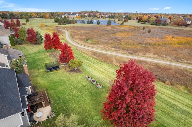 aerial view with a rural view and a water view