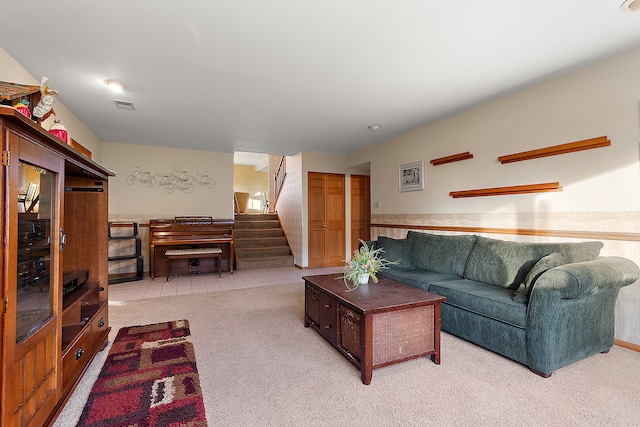 living room featuring light carpet