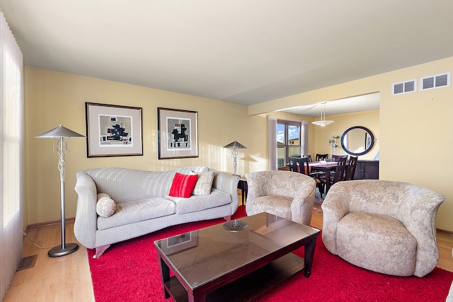 living room with hardwood / wood-style floors