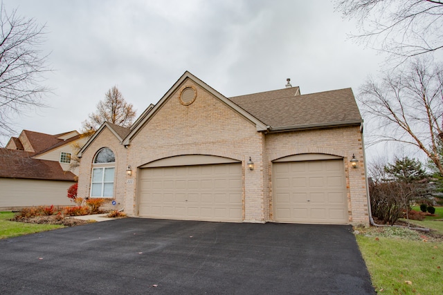 single story home with a garage