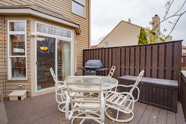 view of patio featuring area for grilling and a deck