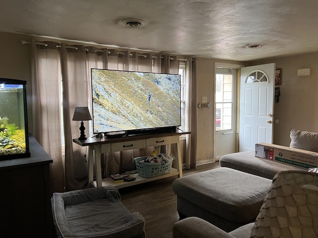 sitting room featuring hardwood / wood-style floors