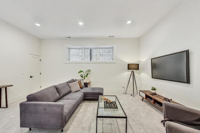 living room featuring light carpet