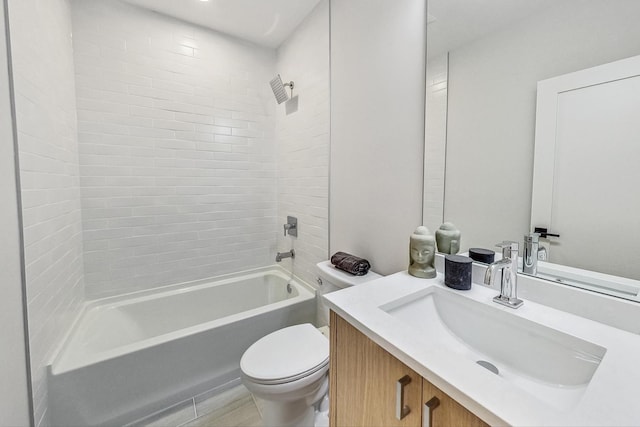 full bathroom with vanity, toilet, and tiled shower / bath combo