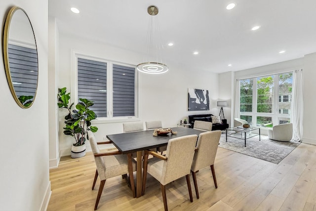 dining space featuring light hardwood / wood-style flooring