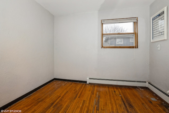 empty room featuring dark hardwood / wood-style flooring