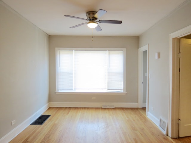 unfurnished room with ceiling fan and light hardwood / wood-style floors