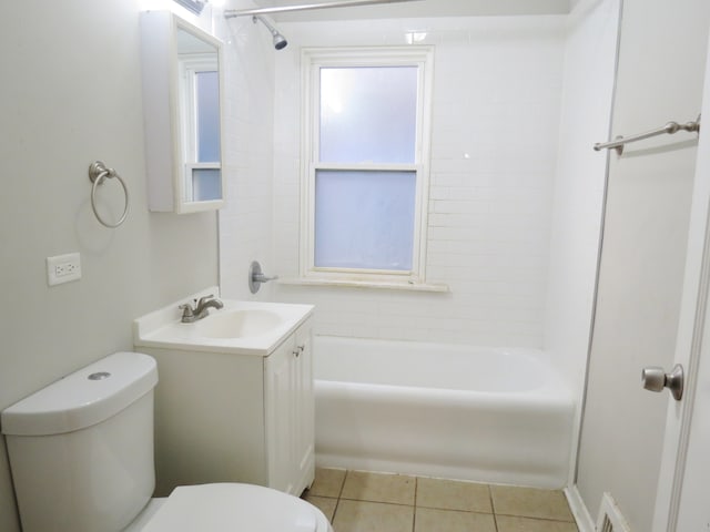 full bathroom featuring tile patterned floors, vanity, toilet, and bathtub / shower combination