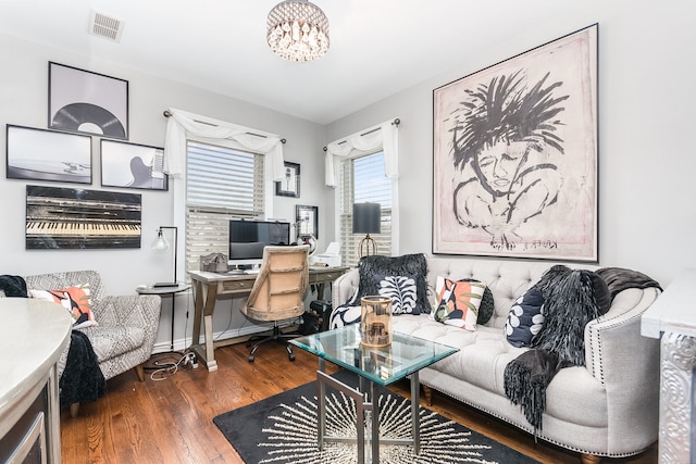 office featuring a notable chandelier and dark hardwood / wood-style floors