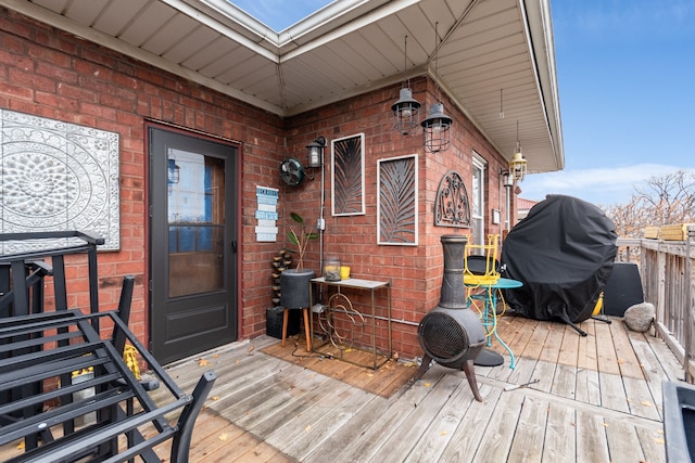 wooden deck with area for grilling