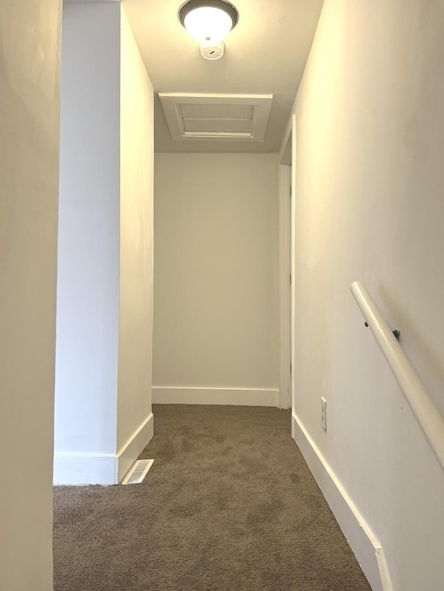 spacious closet featuring dark carpet