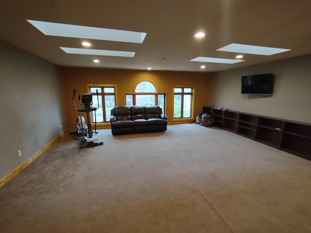 interior space with a wealth of natural light and carpet flooring