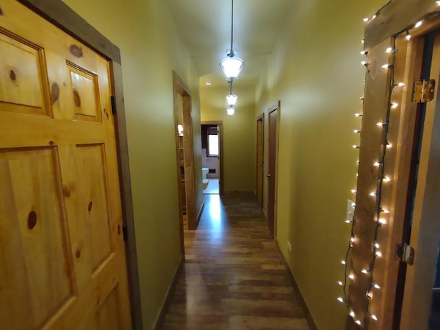 hallway featuring dark hardwood / wood-style floors