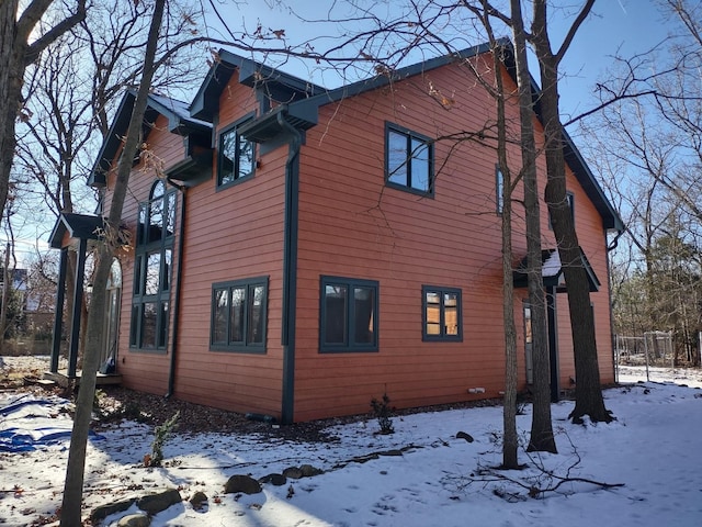 view of snow covered property