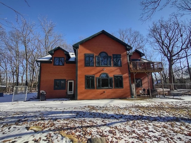 view of snow covered house