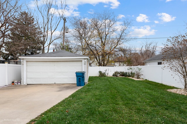 view of yard with an outdoor structure and a garage