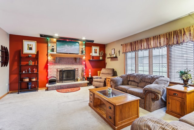 carpeted living room with a brick fireplace