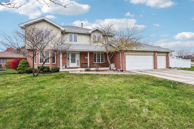 view of front property featuring a front lawn and a garage