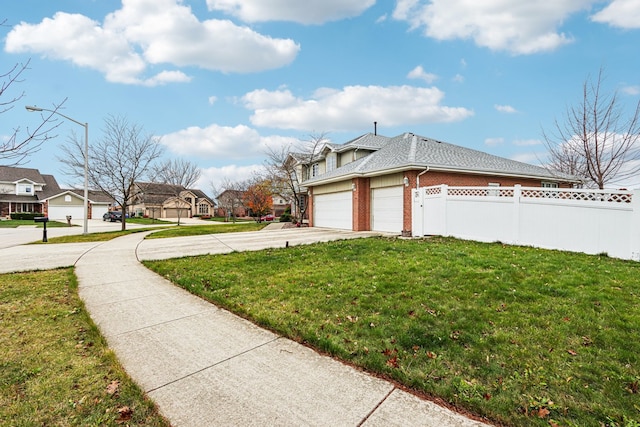 view of side of property featuring a yard