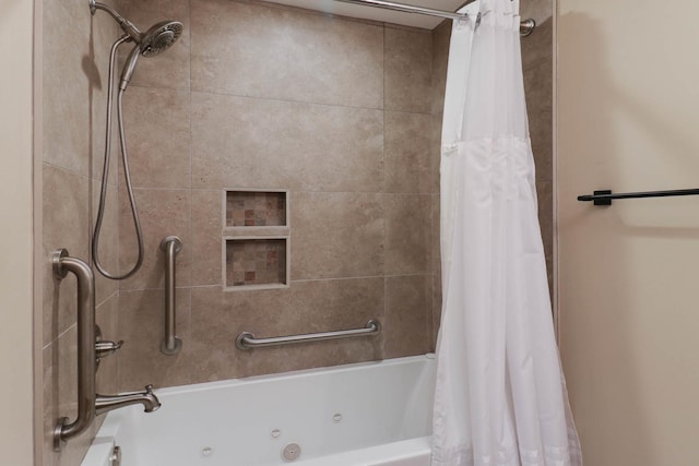 bathroom with shower / bath combination with curtain