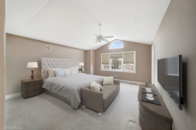 carpeted bedroom featuring ceiling fan and lofted ceiling