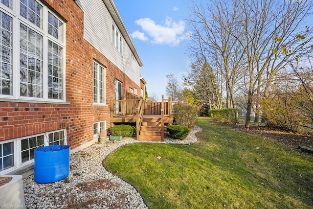 view of yard featuring a deck