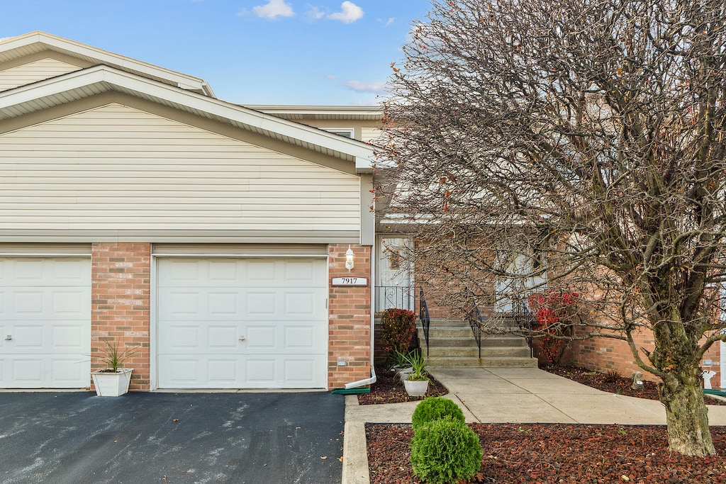 view of property exterior featuring a garage