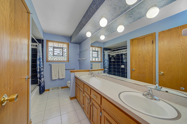 full bathroom featuring shower / bathtub combination with curtain, tile patterned flooring, vanity, and toilet