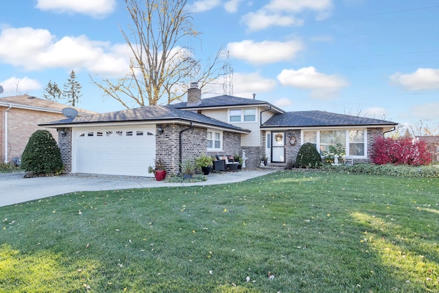 view of front of house featuring a front lawn and a garage