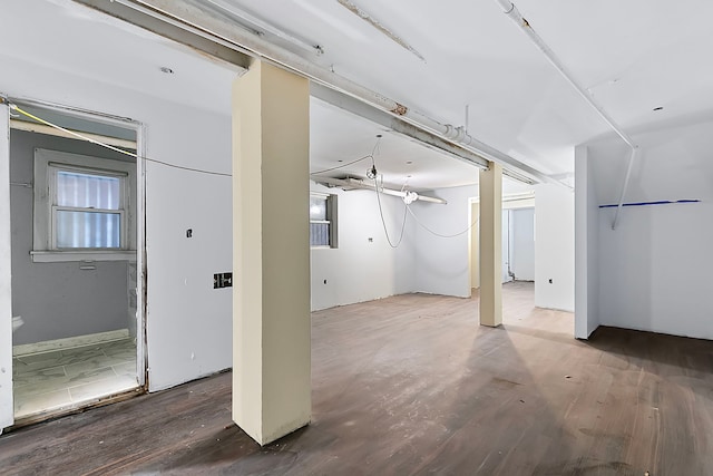 basement featuring hardwood / wood-style flooring