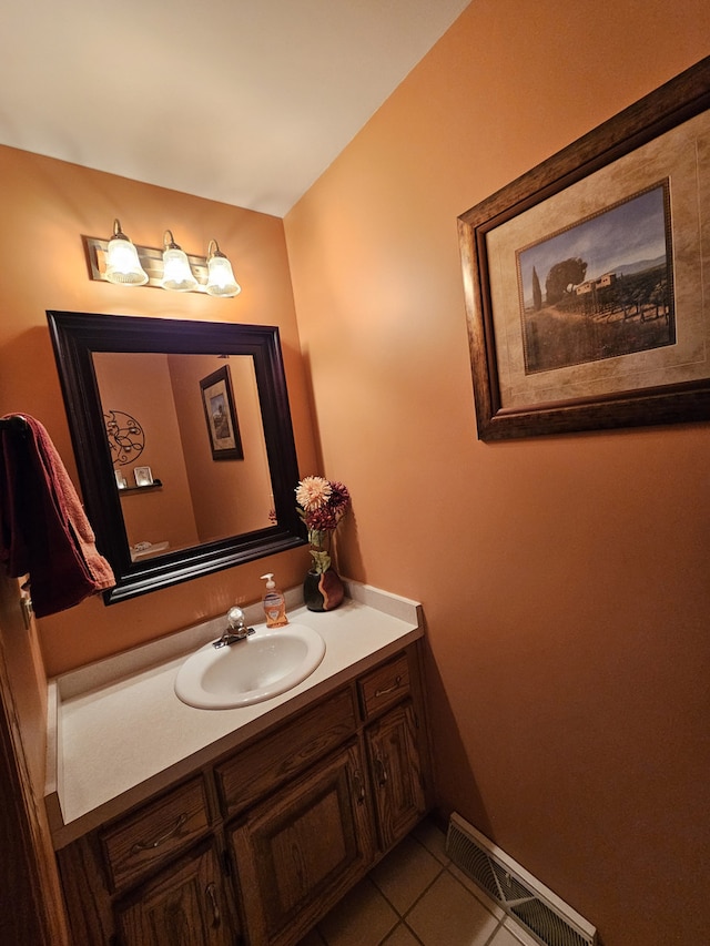 bathroom with tile patterned floors and vanity