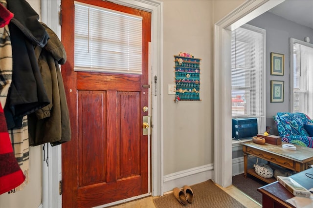 mudroom with light tile patterned floors