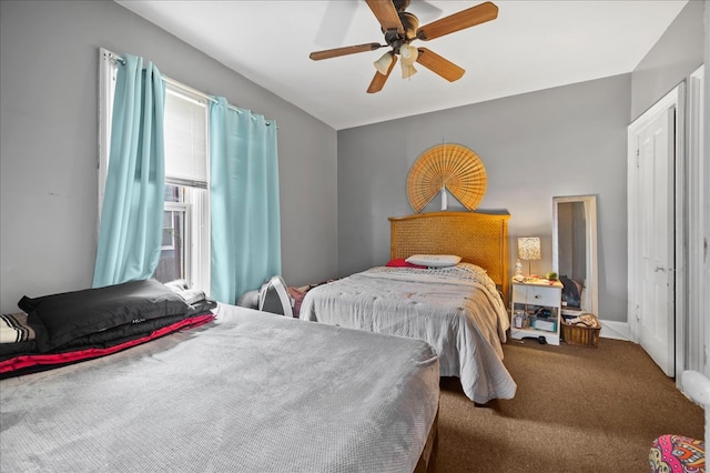 carpeted bedroom featuring ceiling fan