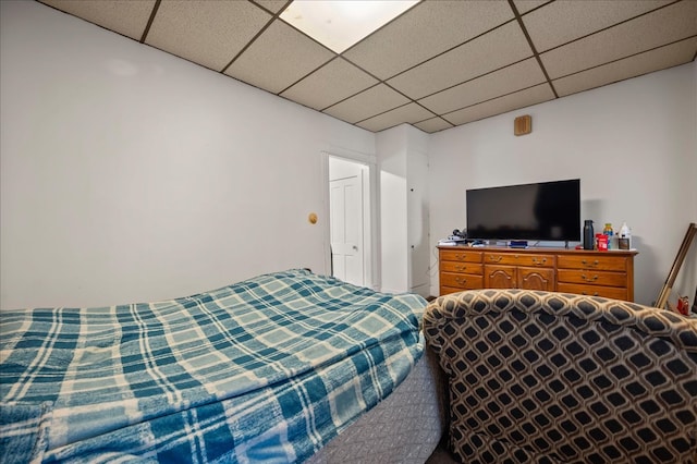 bedroom featuring a drop ceiling