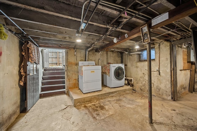 basement with washing machine and clothes dryer