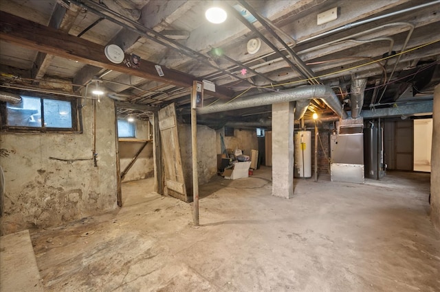 basement with gas water heater and heating unit