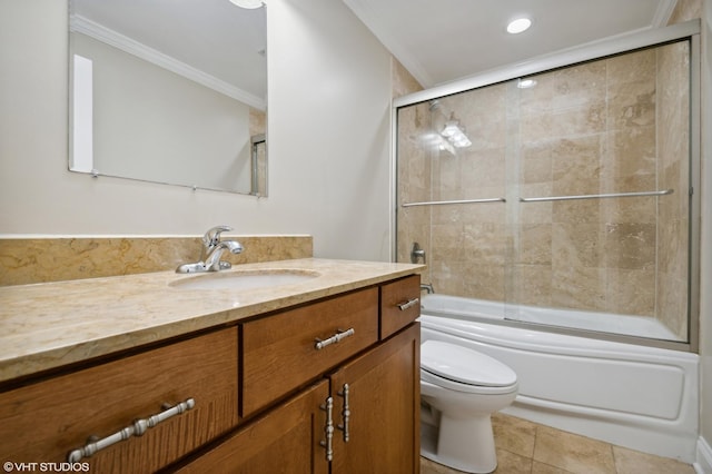 full bathroom with ornamental molding, vanity, enclosed tub / shower combo, tile patterned flooring, and toilet