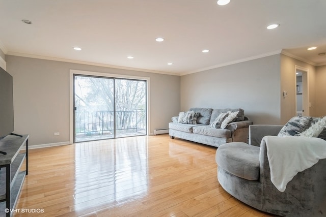 living room featuring crown molding, a baseboard radiator, and light wood-type flooring