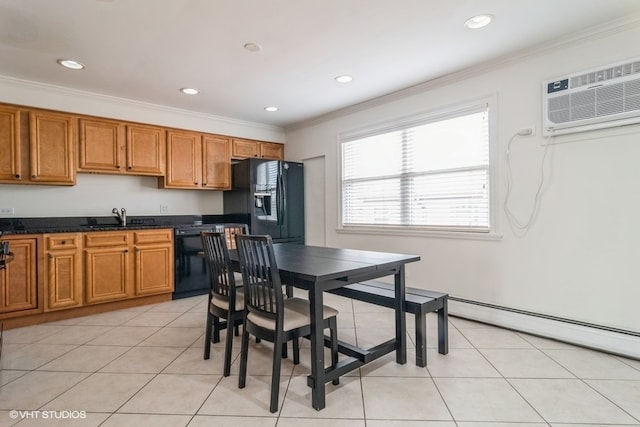 kitchen with sink, an AC wall unit, ornamental molding, and black appliances