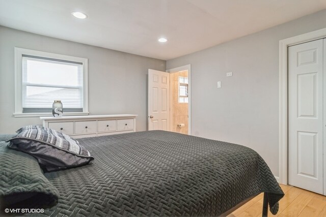 bedroom with light hardwood / wood-style floors